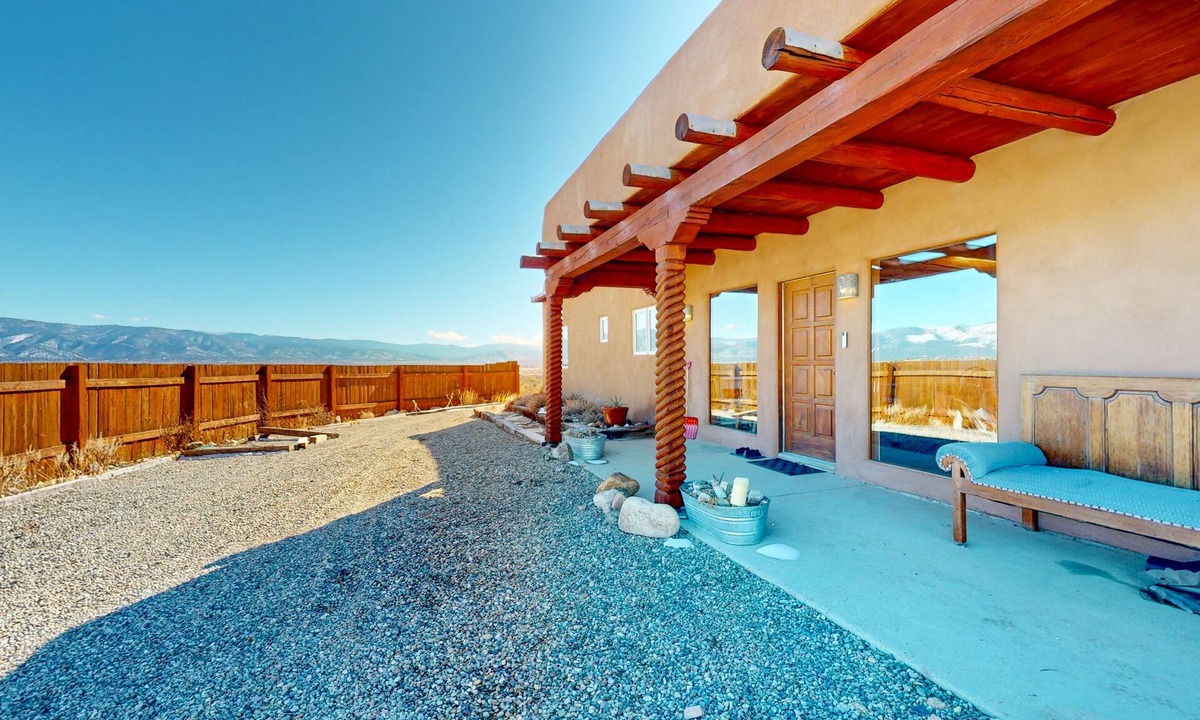 El Prado House | Dog-friendly pueblo on 2 acres with amazing mountain views & kiva fireplace