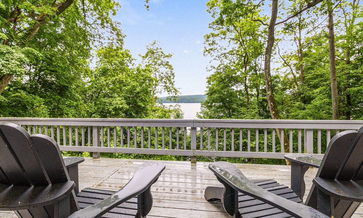North Lake George House | Gorgeous lakeview retreat with wraparound porch, wood stove, & WiFi - dogs OK