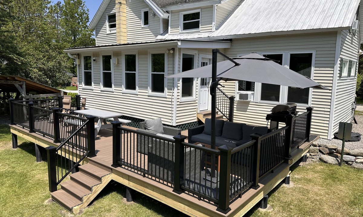 Montgomery Center House | Inviting riverfront home with hot tub on deck & fireplace, near skiing & golf