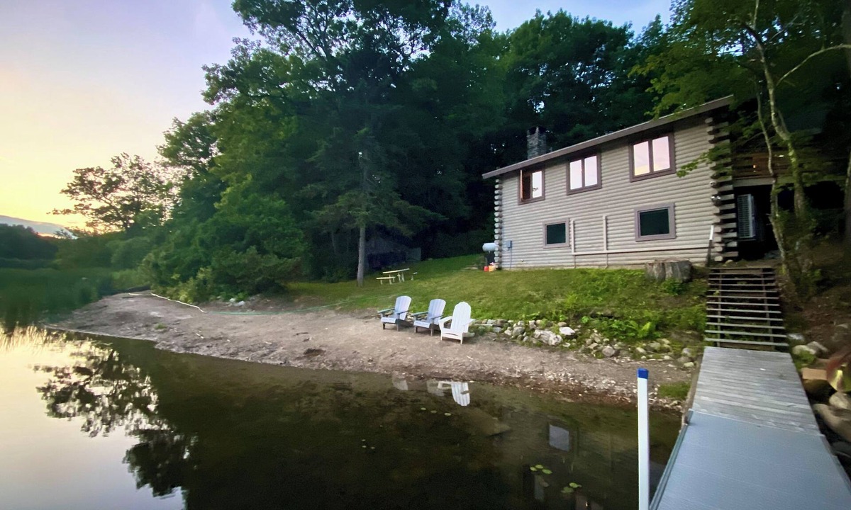 Plymouth House | Lakefront cabin with dock, hot tub, fire pit!