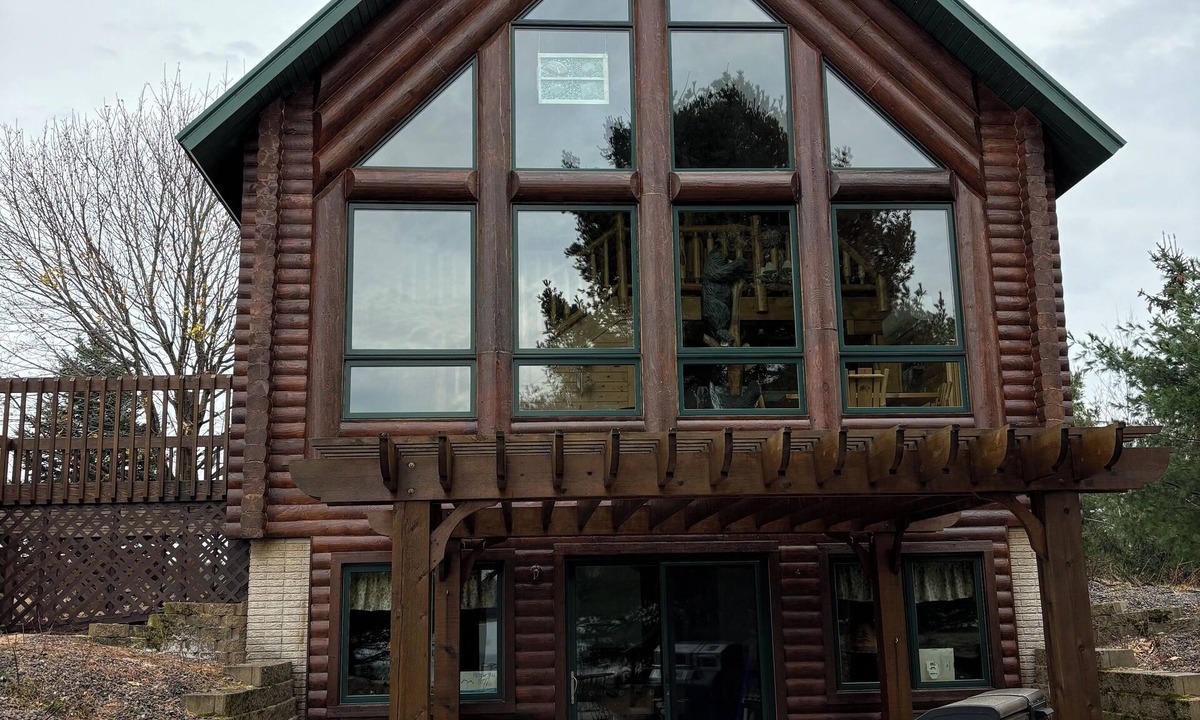 Danbury Cabin | Log Cabin 4-bedroom on water with dock, sand beach with AC, WiFi in Webster