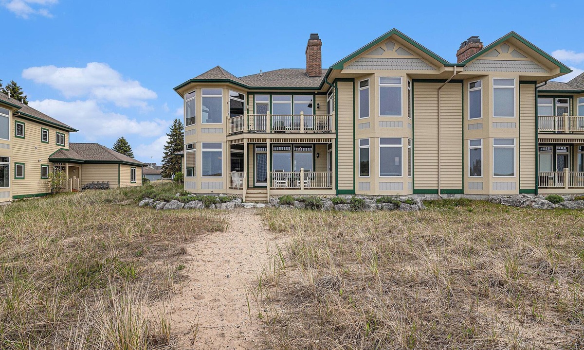 Manistee Condo | Modern Main Floor Waterfront Condo