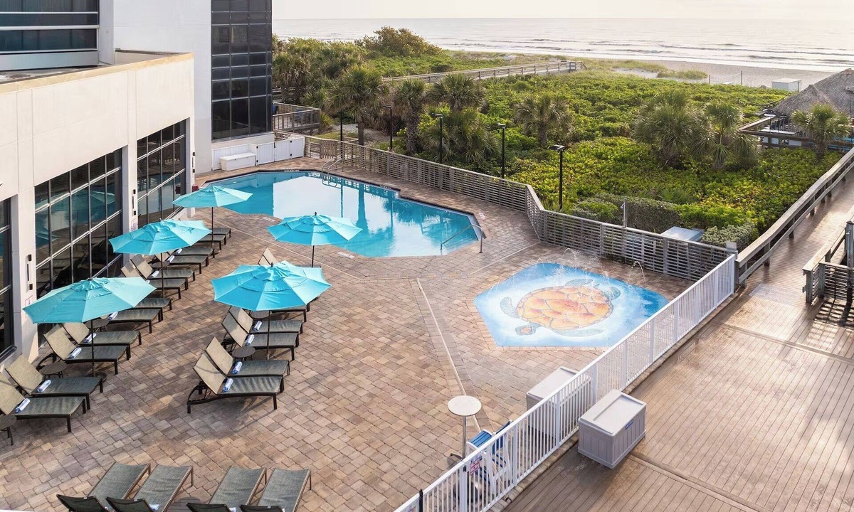 Cocoa Beach Hotel | Perfect Spot for Unwinding | Outdoor Pool, Tiki Grill, Steps to Beach
