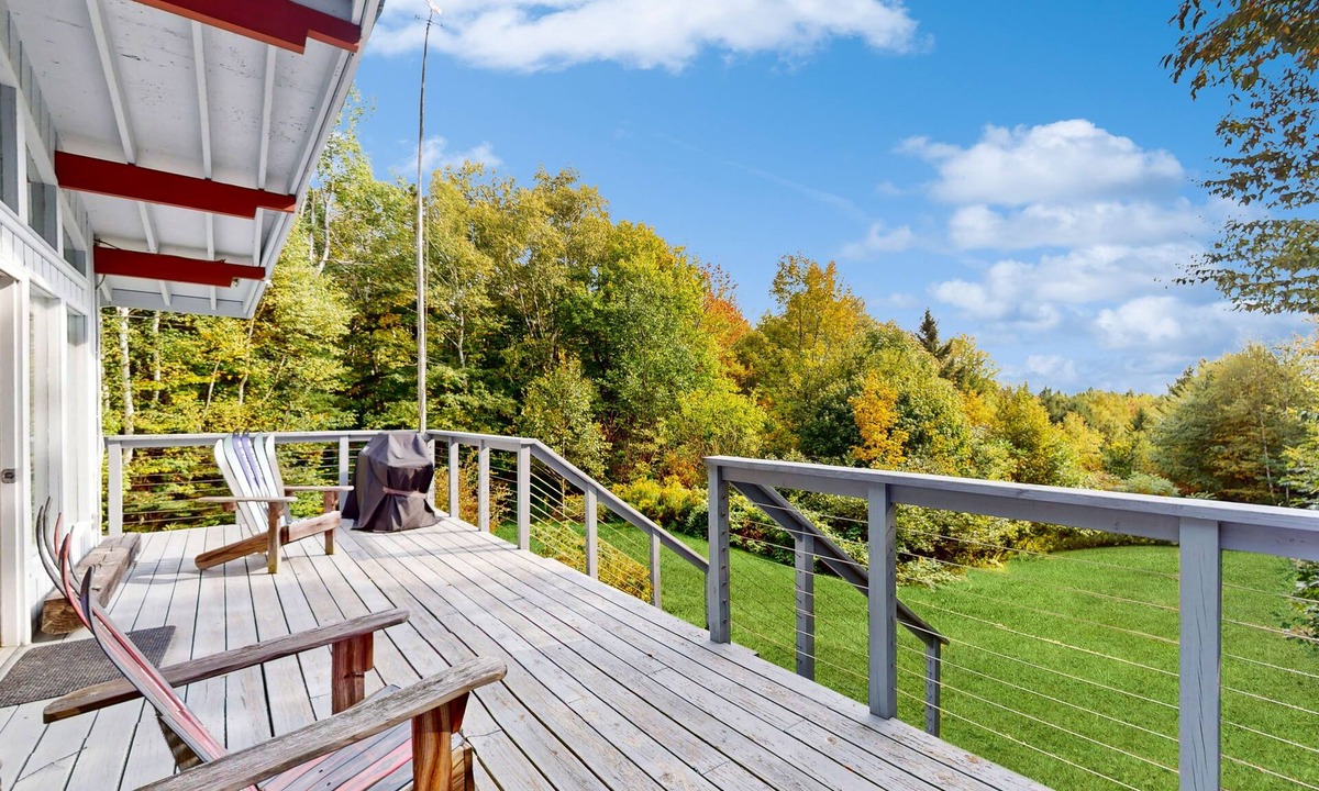Peru House | Picturesque, Euro-style ski chalet with beautiful setting, deck & fireplace
