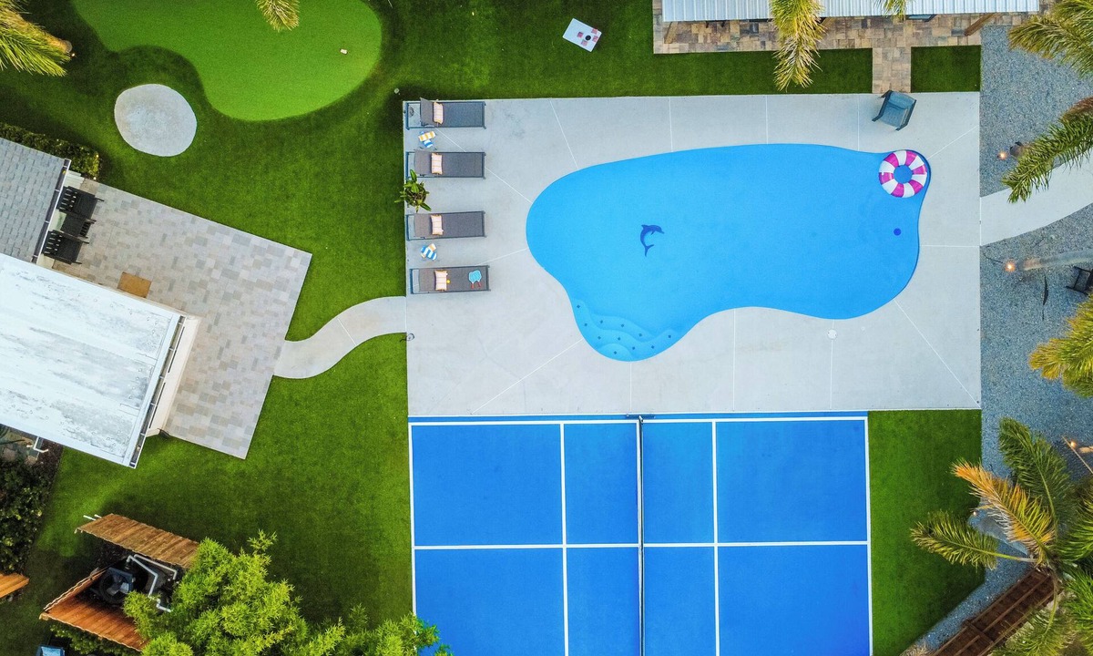 Jacksonville Beach House | Pool, Pickleball & Putting Green Retreat