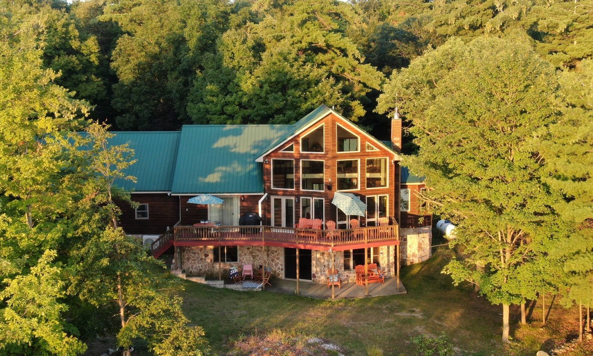 Town of Macomb Cabin | Stunning lake cabin 8 acres of woods, private boat dock, AC, WiFi & dog-friendly