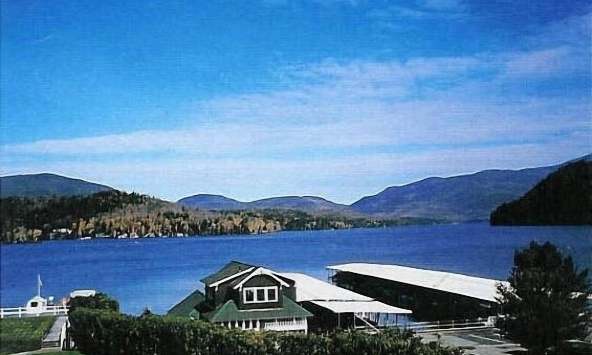 Lake Placid Condo | We sleep 10 (8 adults) Lakefront condo; staggering lake/mountain view; in town.