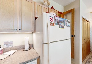 Amazing condo with river & mountain views, hot tub, & wood-burning fireplace