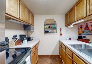 Designer Forest-View Condo with Balcony, Wood Stove & Sunroom - Near Slopes