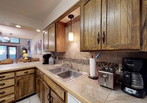 Relax in mountain view condo with nordic skiing and tubing nearby