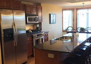 Spacious 2-BR Ski-in, Ski-out Jay Peak Village Condo, right on trail. A/C incl!