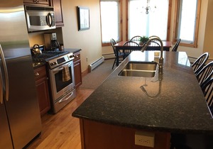 Spacious 2-BR Ski-in, Ski-out Jay Peak Village Condo, right on trail. A/C incl!