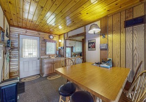 Two cozy, lakefront cottages w/2 docks, a patio, firepit, 2 gas grills, & WIFI