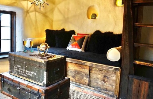 Pilar House | A romantic adobe, river retreat with outdoor tubs.