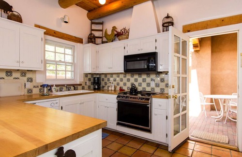 Historic Eastside House | Authentic Santa Fe Home~ Spacious, Vigas, Kiva Fireplaces and Walk to the Plaza
