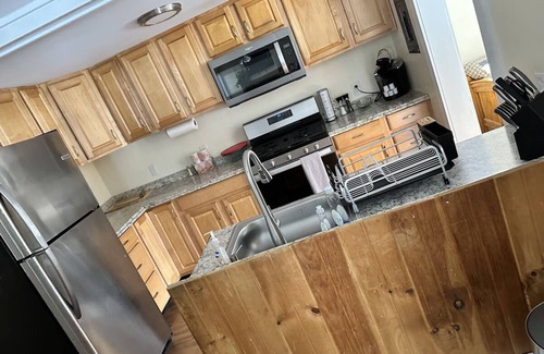 Schroon Lake Hotel | Cozy two bedroom suite with 2 queen beds and a twin.