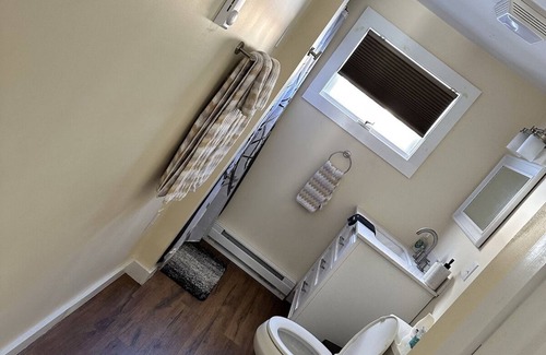 Schroon Lake Hotel | Cozy two bedroom suite with 2 queen beds and a twin.