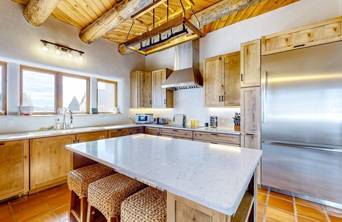 Arroyo Seco House | Dog-friendly villa & studio with mountain view, hot tub, roof deck, & EV charger