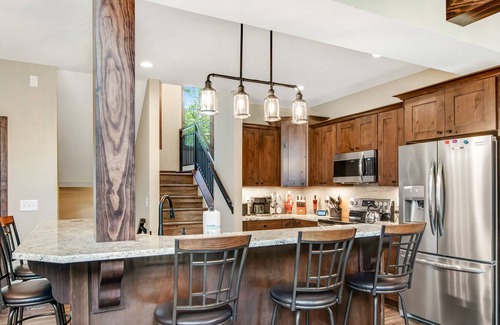 Eagle River Condo | Gorgeous, three-story condo with free WiFi, dock, theater room & lake access