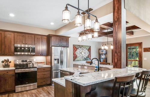 Eagle River Condo | Gorgeous, three-story condo with free WiFi, dock, theater room & lake access