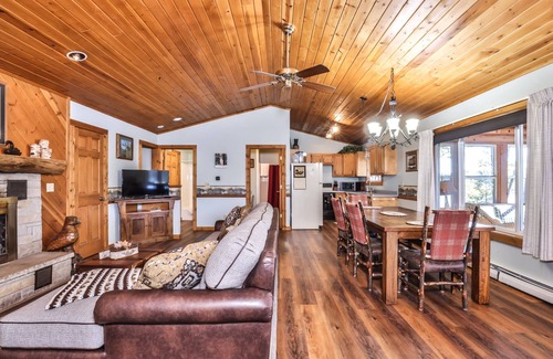 St Germain Cabin | Lakefront cabin with a wood burning fireplace & screen porch