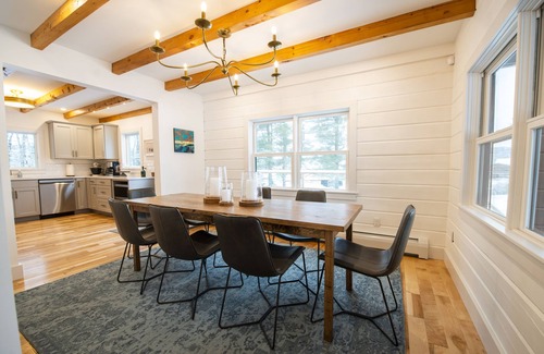 Jericho House | Woodlands: Luxury Vermont log cabin with sweeping views of field and forest.