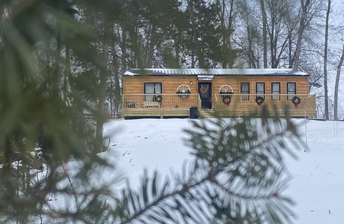 Amery Cabin | 1 Bdr Cabin unit Respite on Apple River. Kayaks, SUPs, and more! Pet friendly!