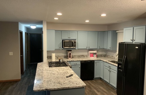North Saint Paul House | 2000 sq ft home with a swimming pool and a hot tub