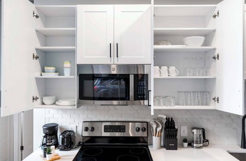 Downtown Cincinnati Apartment | 4BR/2BA Combo | 2 Units at Textile by CozySuites