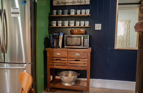 Winnsboro House | A charming quirky retreat nestled amidst the beauty of many majestic trees.