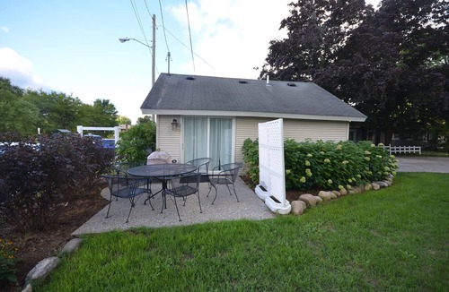Suttons Bay House | Adorable studio cottage in Suttons Bay. Air conditioning. Dog friendly.