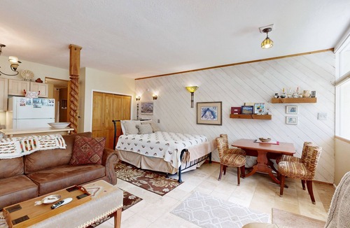 Taos Ski Valley Condo | Amazing condo with river & mountain views, hot tub, & wood-burning fireplace