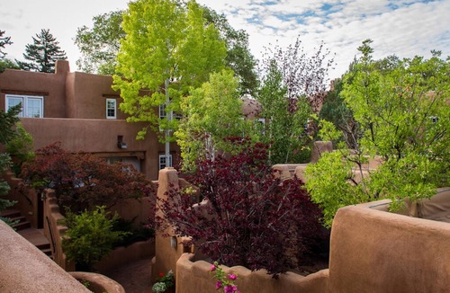 Historic Eastside House | Authentic Santa Fe Home~ Spacious, Vigas, Kiva Fireplaces and Walk to the Plaza