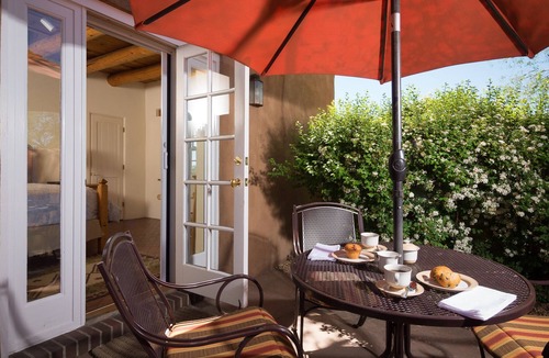 Historic Eastside House | Authentic Southwest Elegance ~Walk to Plaza, Kiva Fireplaces, Private