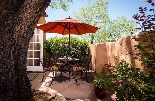 Historic Eastside House | Authentic Southwest Elegance ~Walk to Plaza, Kiva Fireplaces, Private