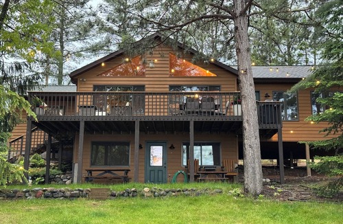 Minong House | Blue Chair Bay offers a 234' sandy beach on Minong Flowage w/impeccable views!