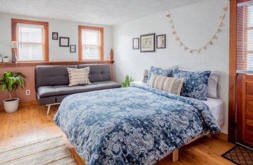 Winooski Falls Mill District Apartment | Bohemian Compound with Hot Tub