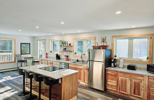 Moretown House | Brand new family home nestled in the woods close to Waterbury, Stowe, and Sugarbush with a hot tub