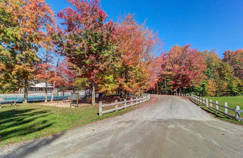 Warren Condo | Bright, mountain escape with pool, hot tub, fireplace, modern kitchen & balcony