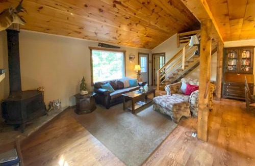 Hayward House | Burns Lake Cabin with Dock, Fire Pit, Rowboat and More