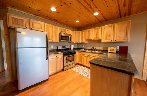 Isle Resort | Cabin 8 Our Romantic Suite offers a jetted tub and views of Mille Lacs lake