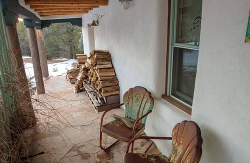 Valdez House | Casita de Colores secluded 2 story adobe amidst serene pine and ponderosa trees.
