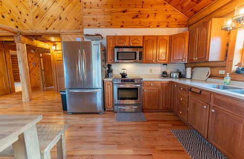 Gould City Cabin | Cedars on South: Lakeside Living – Kayaks, Dock, and Stunning Views!