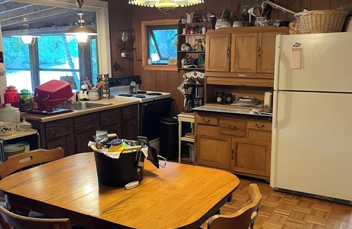 Saranac Lake Cabin | Charming 2-bedroom cabin on the water! Featuring boathouse and dock Saranac Lake