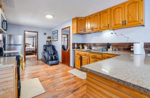 North Saint Paul Apartment | Charming Basement Stay with Workspace AC & Fire Pit