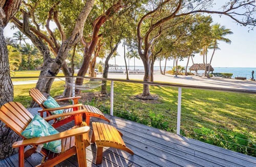 Upper Matecumbe Key Cottage | Charming Bayfront Cottage in Heart of Islamorada with Heated Pool, Deep Dockage, Kayaks & More