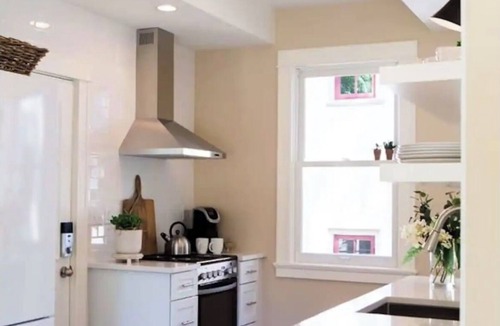 Linden Hills House | Charming Boxwood Cottage in Linden Hills