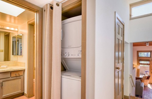 Nambe Pueblo Apartment | Charming condo with fireplace, patio, grill, W/D, & pool - quiet location