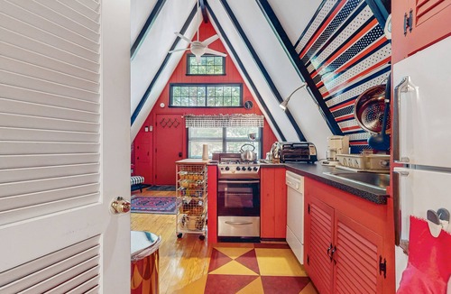 West Townshend House | Charming gingerbread A-frame situated on 3 acres, woodstove, A/C, deck