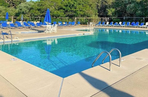 Brewster Apartment | Charming second-floor retreat with a full kitchen and balcony view